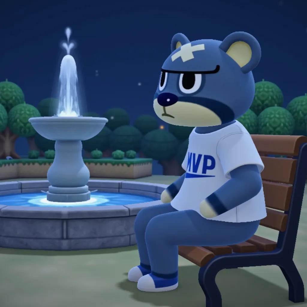 Curt from Animal Crossing sitting down on a bench in front of a fountain at night time, Curt wearing a white MPV shirt with the word 'MVP' being in blue text.